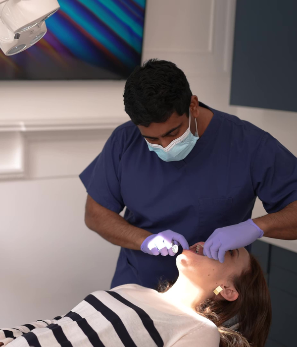 Dentist explaining treatment plan with patient