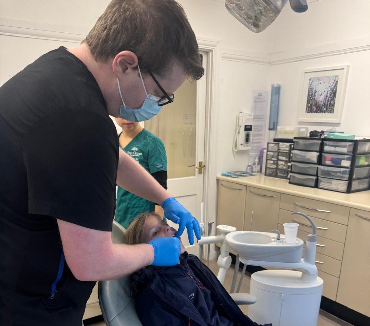 Dr Emmett Hegarty assessing young patient smile development